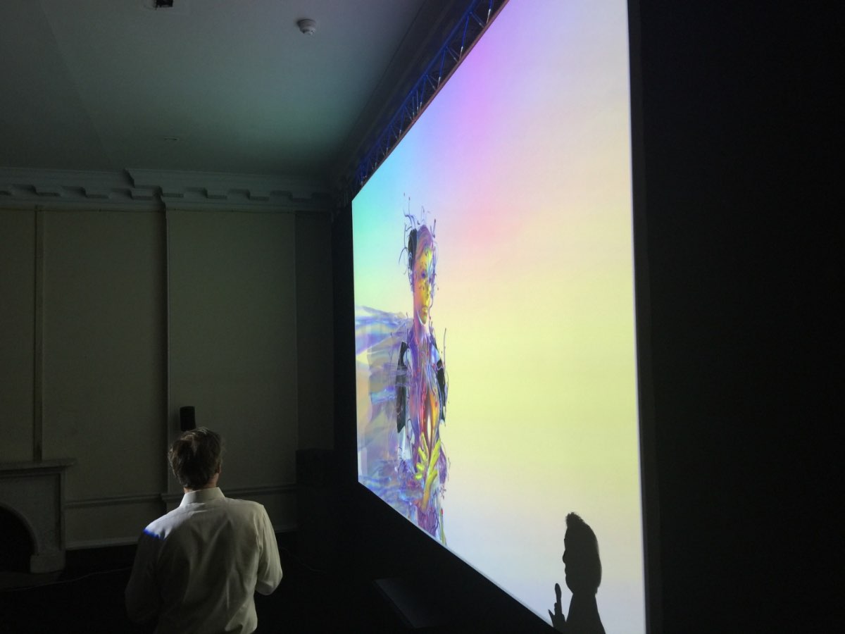 The Notget VR film projected in a darkened gallery.