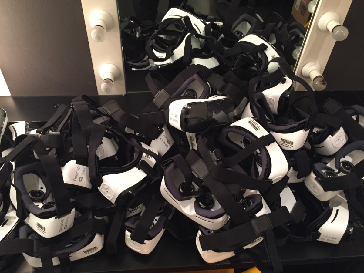 A pile of HTC Vive and Gear VR headsets backstage.
